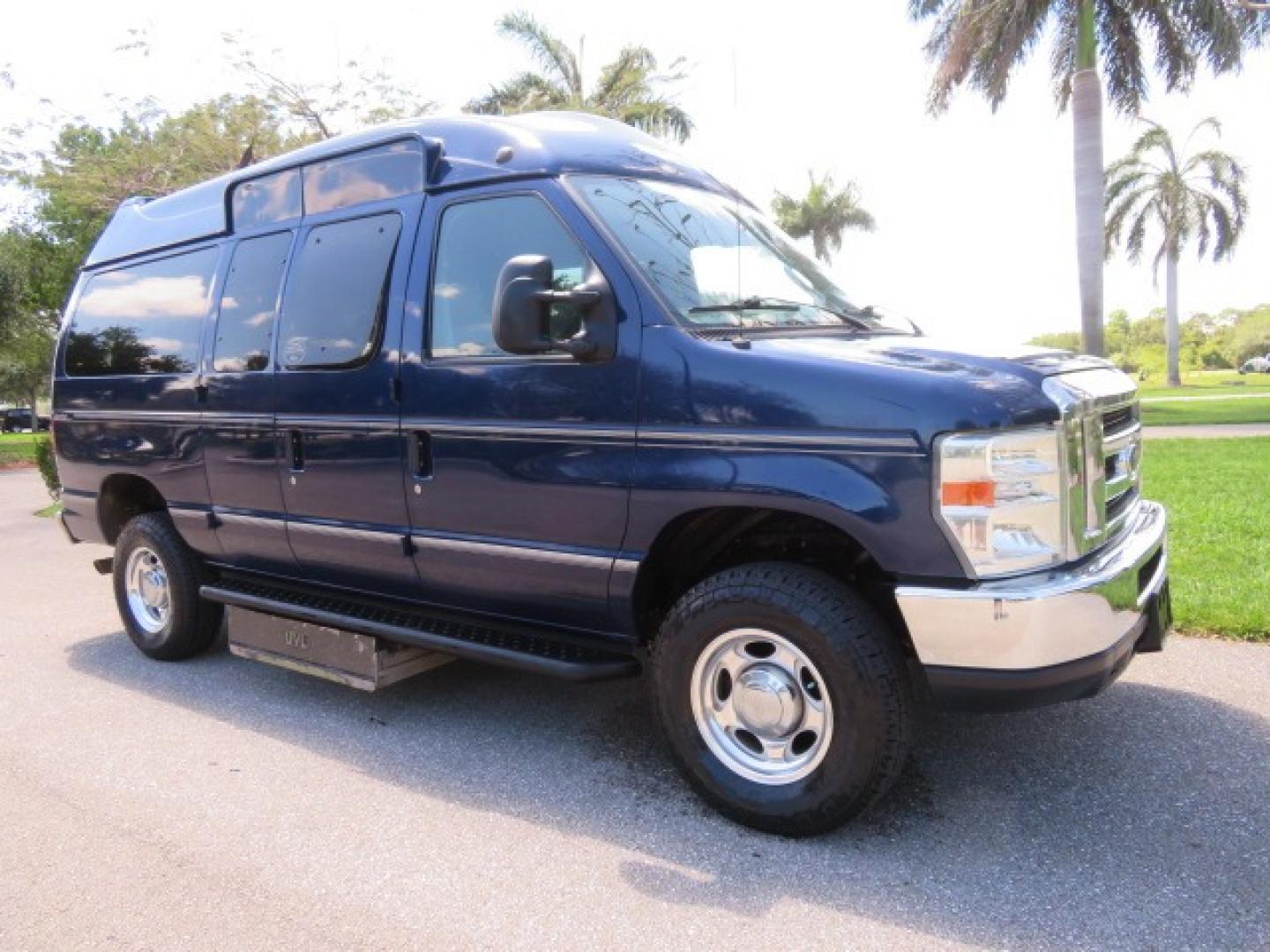 2011 Dark Blue /Gray Ford E-Series Wagon E-350 XLT Super Duty (1FBNE3BS4BD) with an 6.8L V10 SOHC 20V engine, located at 4301 Oak Circle #19, Boca Raton, FL, 33431, (954) 561-2499, 26.388861, -80.084038 - You are looking at a Gorgeous 2011 Ford Econoline E350 XLT Norcal Max High Top Handicap Wheelchair Conversion Van with 6.8L V10, 15K Original Miles, 9 Inch Lowered Floor, Braun UVL Side Entry Wheelchair Lift, Remote Control Power Side Entry Doors, Expanded Side Entry Doors, Q Straint Tie Down, Syste - Photo#7